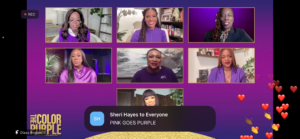Screenshot of Black women dressed in purple talking about The Color Purple movie