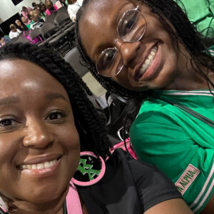 Two black women smiling